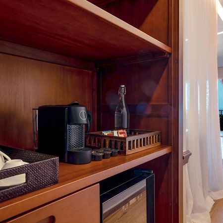 The Mora Zanzibar Hotel Matemwe  Exterior photo A Nespresso machine in a hotel room