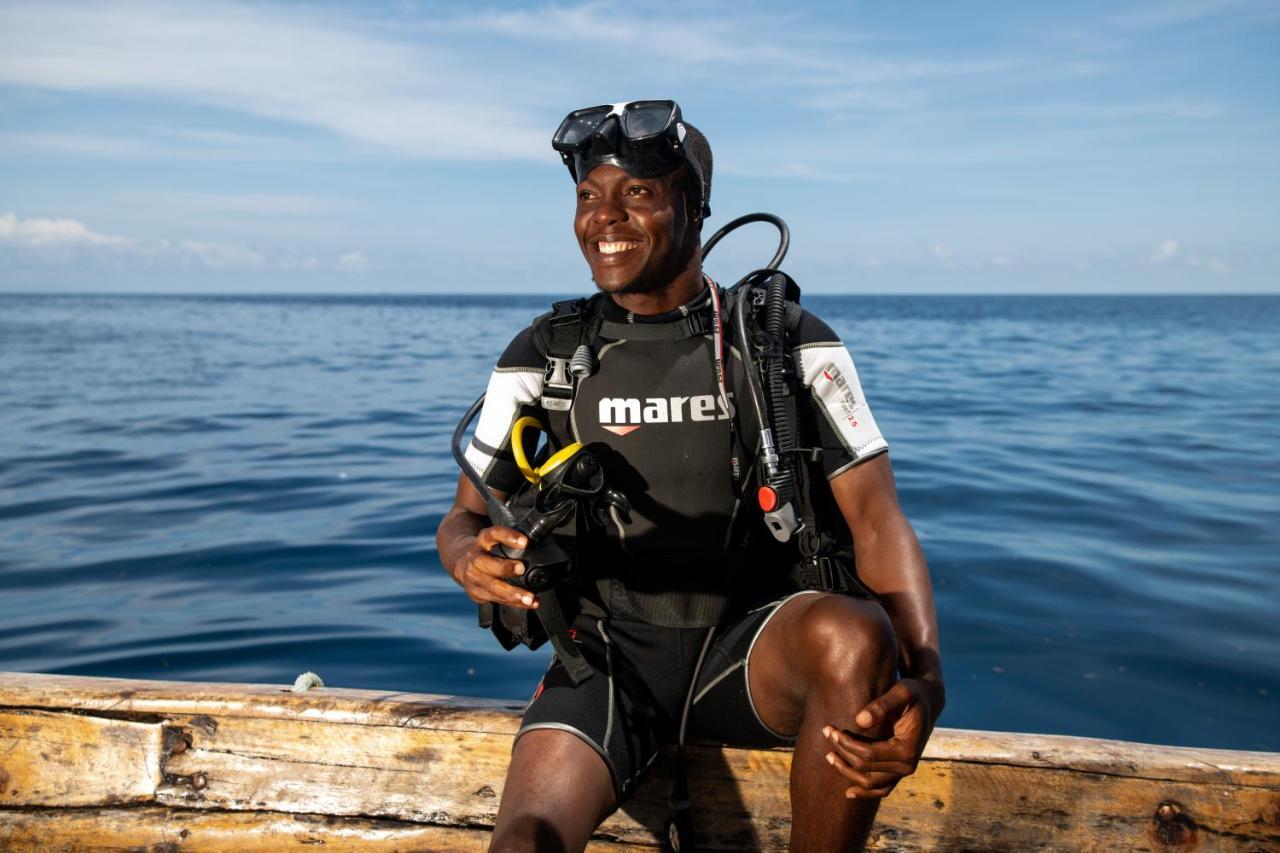 The Mora Zanzibar Hotel Matemwe  Exterior photo A scuba diver